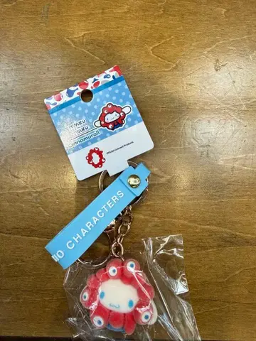 신상 산리오 미야쿠미야쿠 플로키 스트랩 키링 시나몬