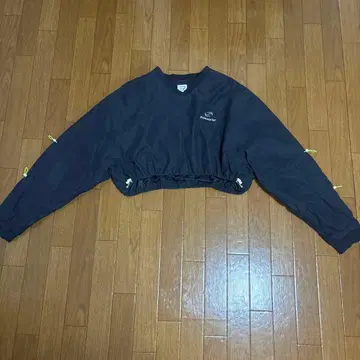 StorageTek 크롭 기장 바람막이