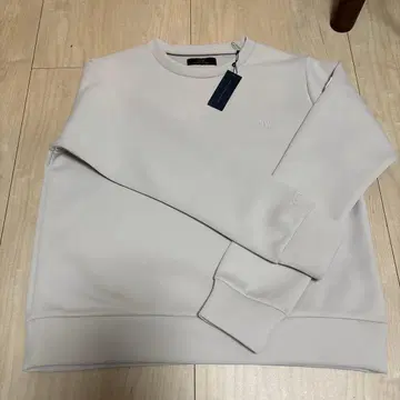 다니엘 웰링턴 베이지 상의 맨투맨 트레이닝복