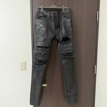 Julius 코팅 데님 팬츠