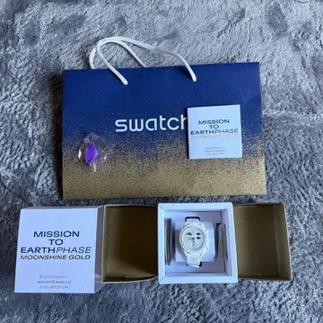 Swatch MISSION EARTHPHASE MOONSHINE GOLD
