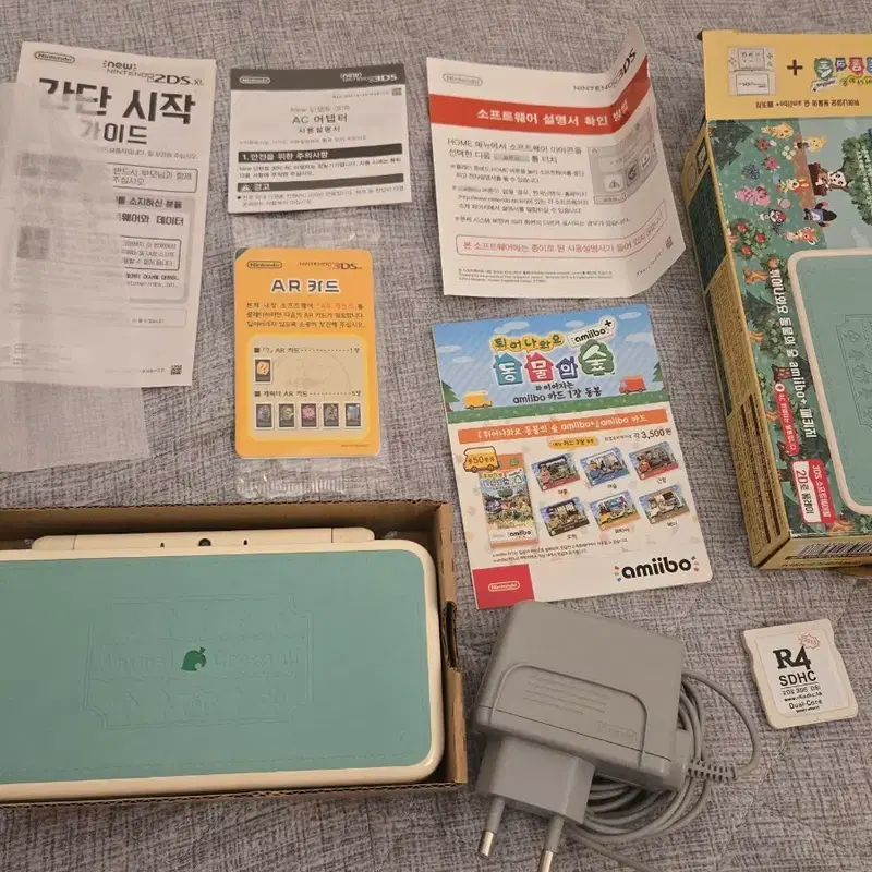 닌텐도 뉴 2DS XL 튀어나와요 동물의 숲 에디션