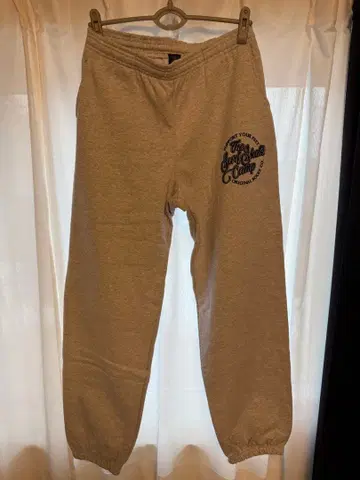 SURFSKATECAMP 그레이 스웨트 팬츠 프린트 로고