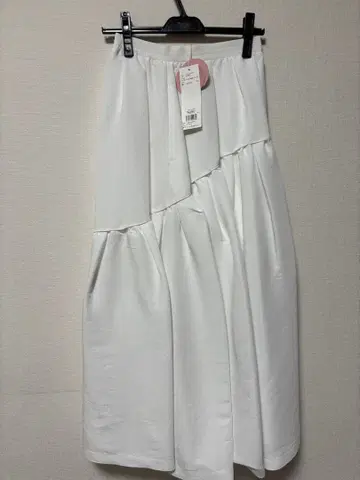 emmi 발수 티어드 볼륨 스커트