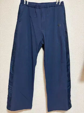 UMBRO (엄브로) BEAUTY&YOUTH 별주 나일론 팬츠