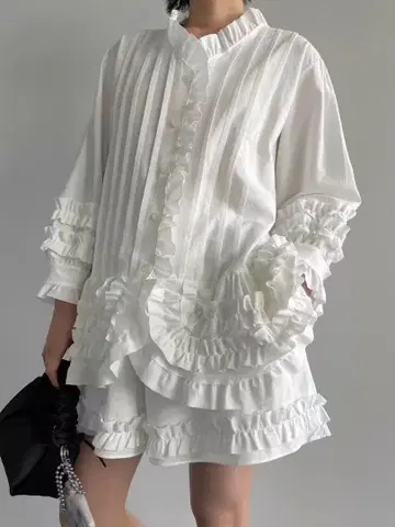 휘핑 프릴 튜닉 블라우스 로지몬스터 스나이델