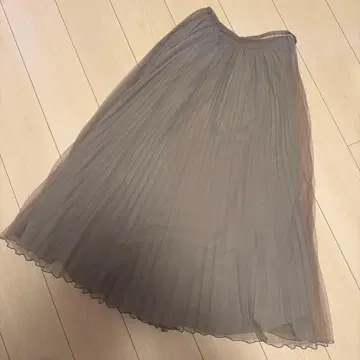 스터닝 루어 시어 플리츠 스커트