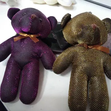 곰 모양 봉제 인형 보라색과 금색