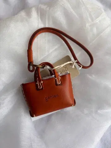 [미사용 새상품] genten 겐텐 아머노 백참 가죽 키링