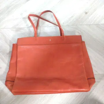 앙리크 일 오렌지 가죽 가방