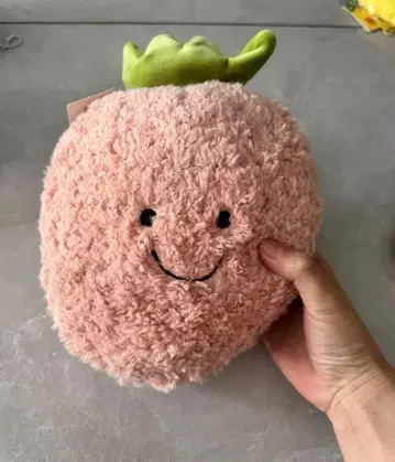 핑크색 웃는 얼굴 봉제 인형