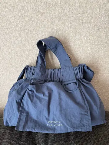 BEYOND THE VINES XS Dumpling Bag