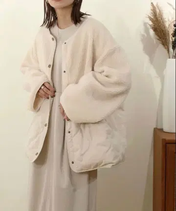 NOAHL 퀼팅 보아 절개 코트