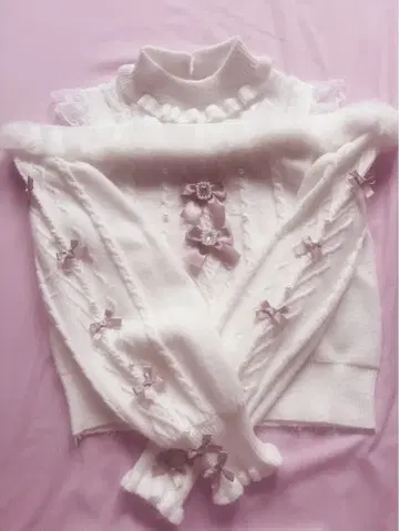 노에미 비쥬 리본 케이블 오프숄 퍼 니트