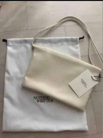 나싱 리튼 nothing written 숄더