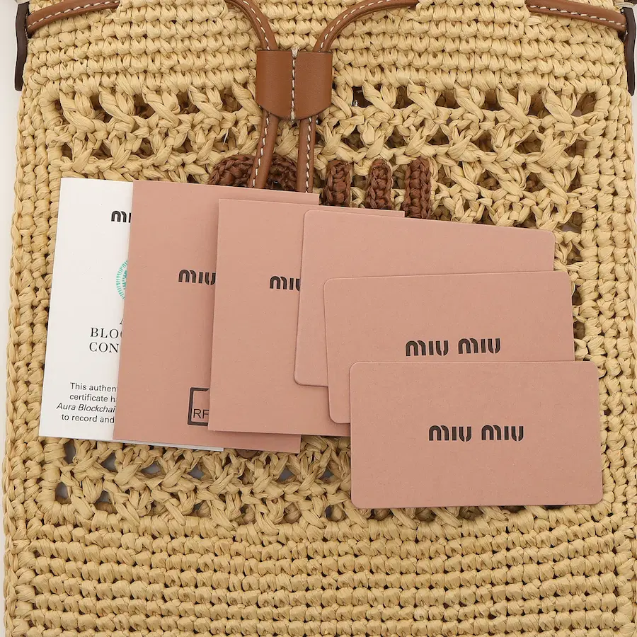 Miu Miu 编织面料抽绳手提包 迷你款 干邑色