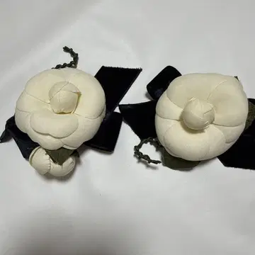 잉게보그? 카네코 이사오? 까멜리아 코사지