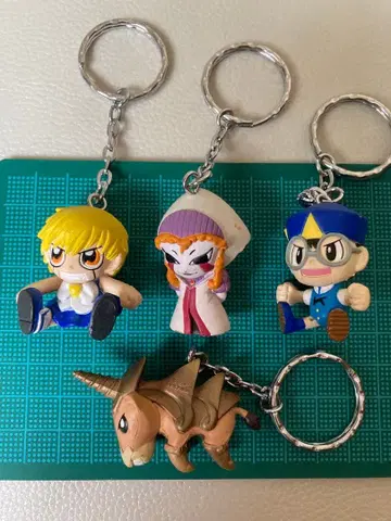 골드 컬러의 갓슈벨 애니메이션 캐릭터 키링 4개 세트