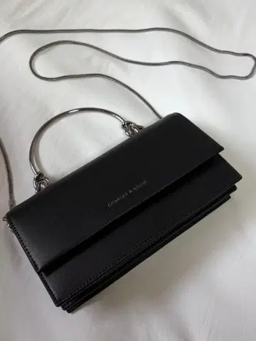 스컬프처 핸들 롱 지갑