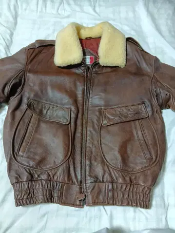 브라운 가죽 자켓 양가죽 옷깃