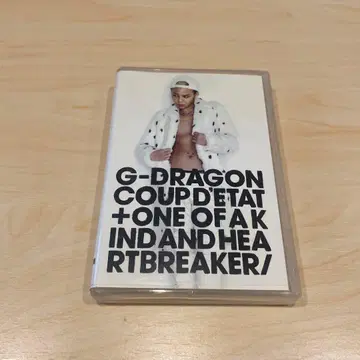 G-DRAGON ONE OF A KIND 플레이 버튼