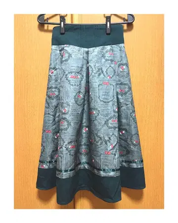 axes femme POETIQUE 스트로베리 라벨 턱 스커트