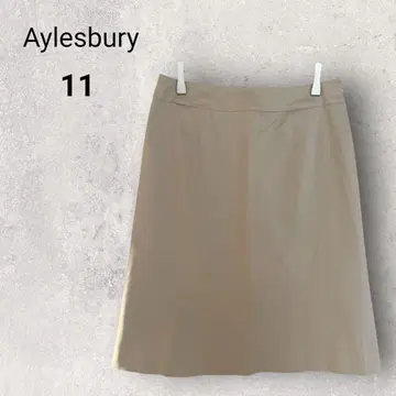 앨리스버리 미디 기장 사다리꼴 스커트 11 라이트 베이지 오피스 심플
