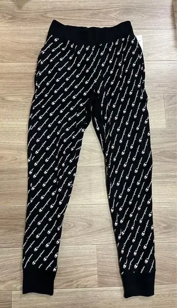 챔피온 REVERSE WEAVE 올 패턴 로고 스웨트 팬츠