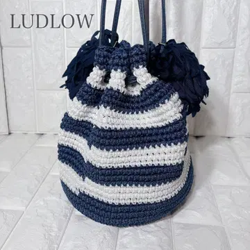 라들로 라피아 태슬 보더 복조리백 숄더백