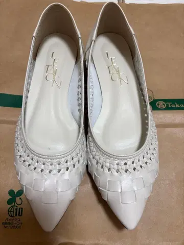 루타론 화이트 꼬임 플랫슈즈