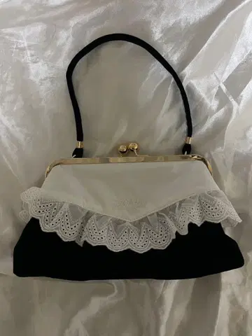 Bibiy. SABRINA LACE BAG