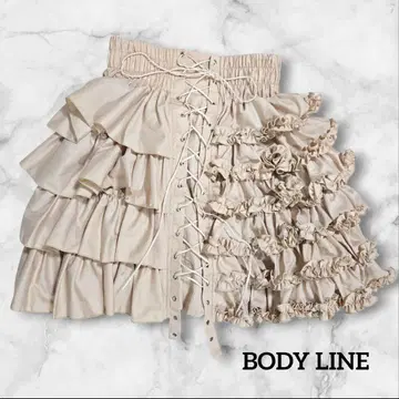 새상품급 BODYLINE 비대칭 레이스업 티어드 프릴 스커트