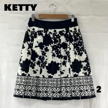 Ketty 무릎 기장 턱 스커트