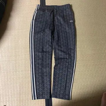 Lacoste 모노그램 팬츠