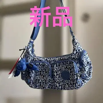 Kipling 기하학 패턴 숄더백