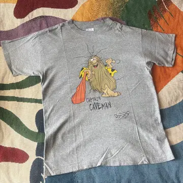 90s Stanley Desantis captain caveman tee