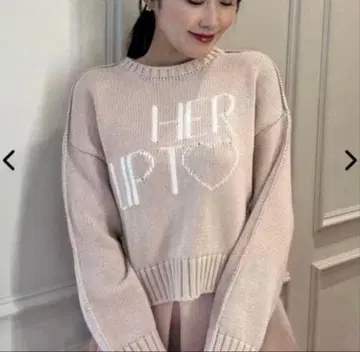 Her lip to Share The Love Knit Top