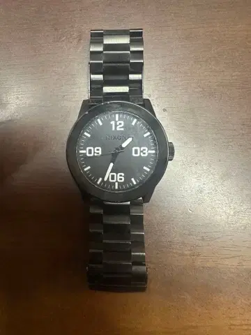 NIXON 아날로그 쿼츠 손목시계 블랙