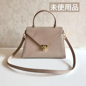 릴리 브라운 사다리꼴 핸드백 핑크 베이지 악어 무늬