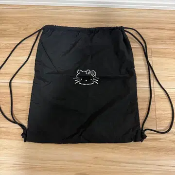 산리오 헬로키티 SPINNS 콜라보 냅색