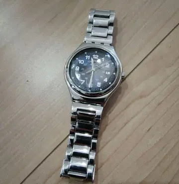 Swatch 아날로그 쿼츠 손목시계