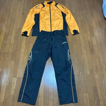 아식스 FOOTBALL GEAR 윈드 브레이커 오렌지/블랙