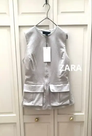 [ 택 포함 미사용 새상품 ] ZARA 그레이 슬리브리스 상의