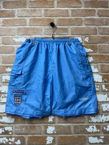 90s 엄브로 잉글랜드 대표 하프 팬츠 스카이블루 자수 구제 의류