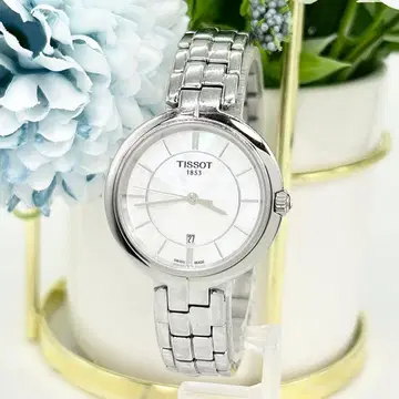 TISSOT 티쏘 플라밍고 쉘 다이얼 T094210 쿼츠 손목시계
