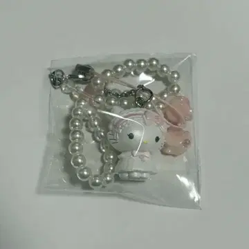 화이트 프릴 디자인 시크릿 스트랩 챠미 키티