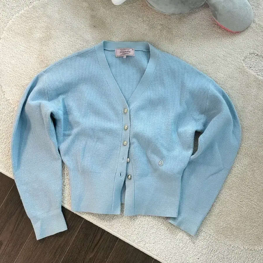 Rolarola One-Off Shoulder Stripe Cardigan on Bunjang Global Site.