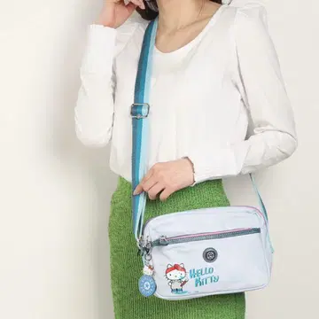 키플링 스카이블루 산리오 키티 콜라보 가방 백 사선