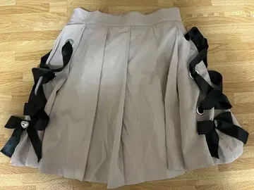 앙크루즈 비쥬 리본 포함 플리츠 스커트