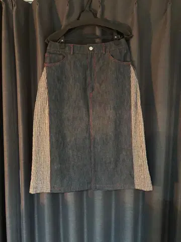 This Uniform Denim Pleat Skirt